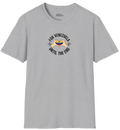 Light gray T-shirt featuring the Venezuelan flag inside heart-shaped hands, the text "FOR VENEZUELA UNTIL THE END" around it, and one macaw on each side.