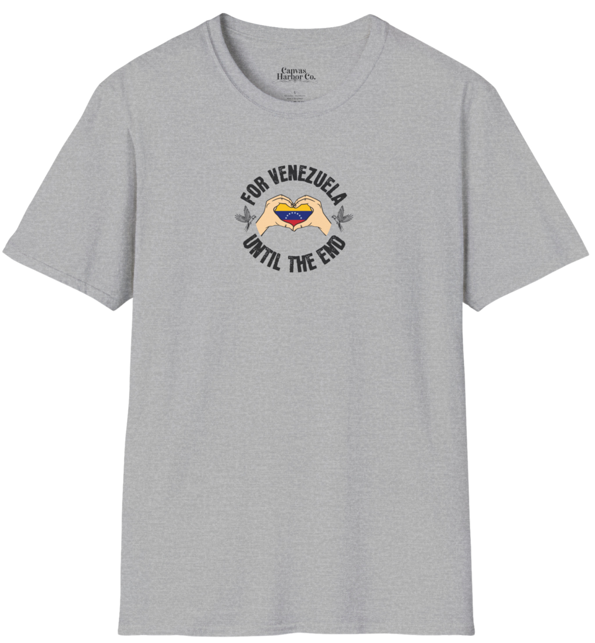 Light gray T-shirt featuring the Venezuelan flag inside heart-shaped hands, the text "FOR VENEZUELA UNTIL THE END" around it, and one macaw on each side.