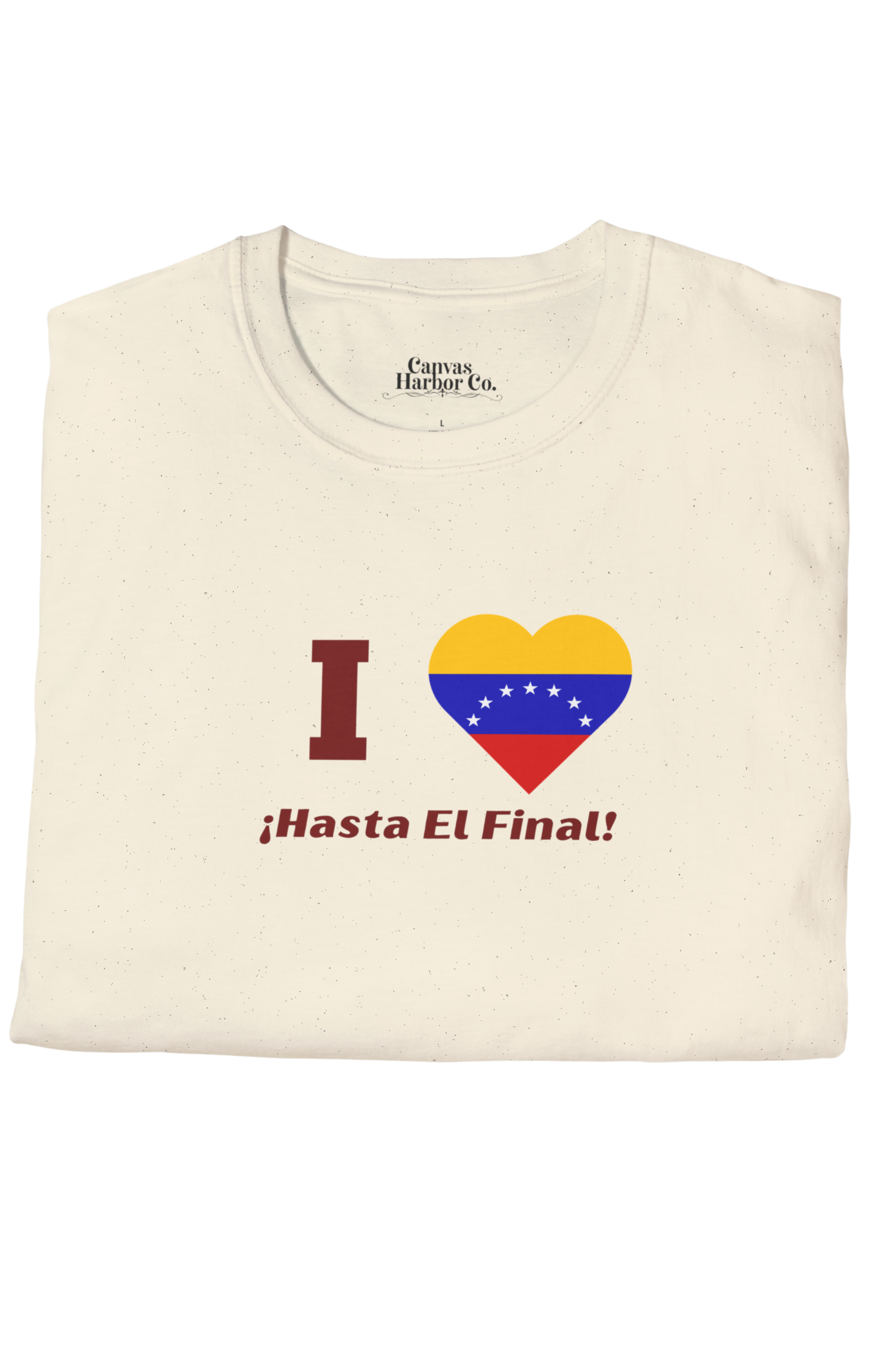Pale orange folded T-shirt featuring the 7-star Venezuelan flag in the shape of a heart, the word "I" on the left, and the text "¡HASTA EL FINAL!" below.