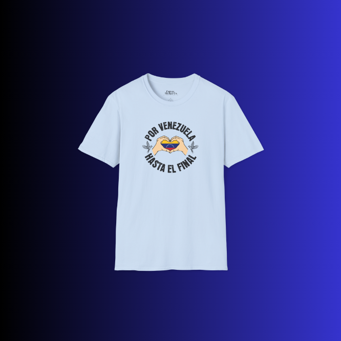 A light-blue unisex t-shirt featuring a Venezuelan flag inside heart-shaped hands, the text "Por Venezuela Hasta El Final", and a pair of macaws on either side.