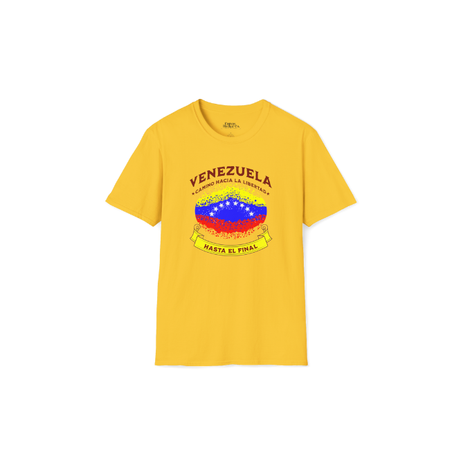 A yellow unisex t-shirt featuring a colorful, elliptically Venezuelan flag dotted (like an explosion), with the text "Venezuela Camino Hacia La Libertad" at the top and "Hasta El Final" on a yellow ribbon below the flag.