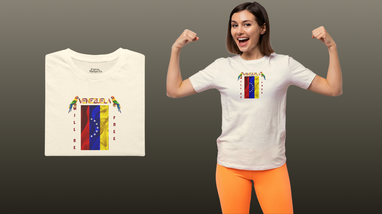 Pale orange folded T-shirt featuring the 7-star Venezuelan flag, the name VENEZUELA at the top, and one macaw on each side. The words WILL BE and FREE are all placed vertically next to the flag. 
On the right, a smiling woman is wearing the T-shirt. She’s standing, lifting her arms.
